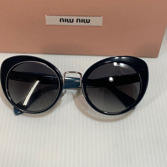 Miu Miu woman’s sunglasses smu 06TTMY-5D1 cat eye made in Italy main image 6